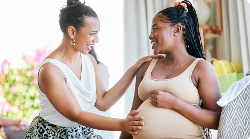 Two women, one pregnant